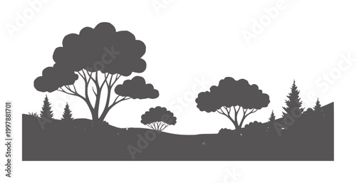 Dark silhouette landscape of varied trees and rolling hills