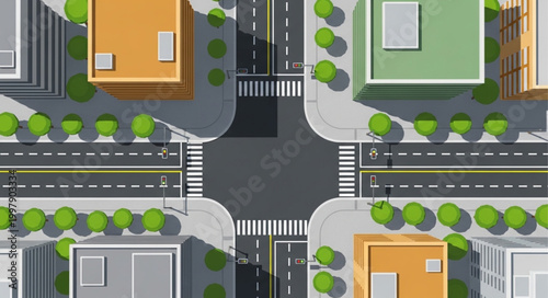 Aerial View of City Intersection with Buildings and Trees.