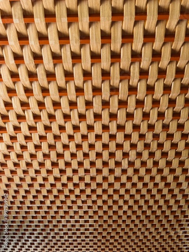 High-Angle Close-Up of an Intricate Jali Brick Wall Pattern with Terracotta Tiles and Geometric Shadow Play