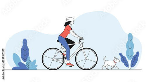 Active woman wearing a safety helmet while cycling her bicycle through a green park with her dog running nearby.