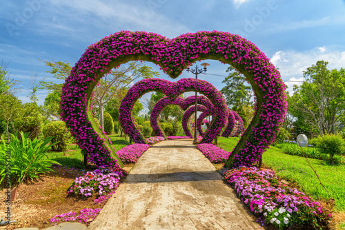 Awesome walkway decorated with heart-like flower arches