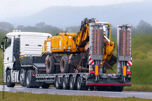Tableau sur toile Road logistics for heavy construction industry equipment