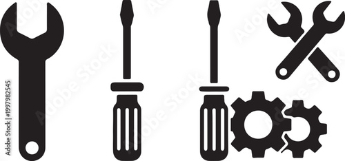 Collection of diverse tools including wrenches, screwdrivers, and gears, representing repair, construction, and mechanical tasks