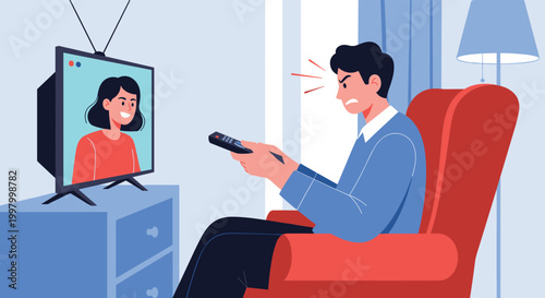 Frustrated man sitting in a red armchair gets angry while watching a television program and using a wireless remote control.