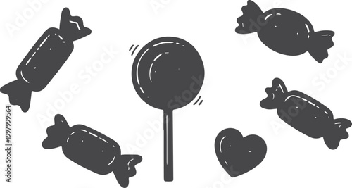 Black silhouette candies and lollipop on white