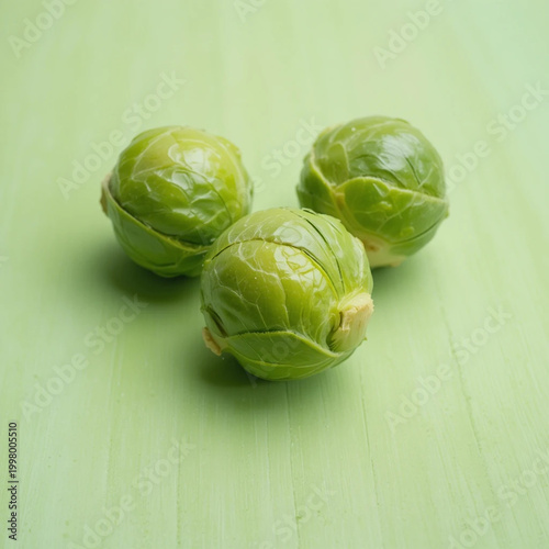 Brussels sprouts on a green isolated