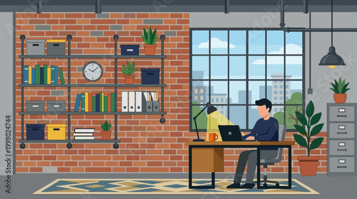 Man working on laptop at modern office desk.