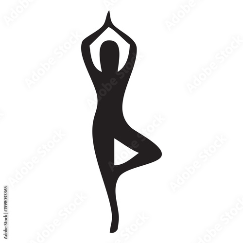 Silhouette of a person performing the tree pose yoga position.