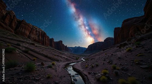 Bright Milky Way Galaxy Above Deep Desert Canyon with Stars Reflected in Creek
