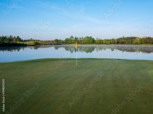Green and flag at Dawn on Robert Trent Jones Golf Trail