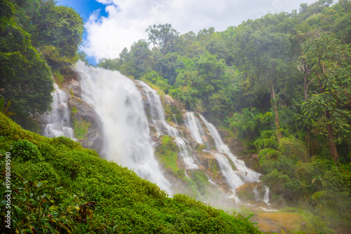 Bild auf Leinwand Wachirathan Waterfall is a beautiful large waterfall in deep forest on Doi Inthanon, Chiang Mai, Thailand