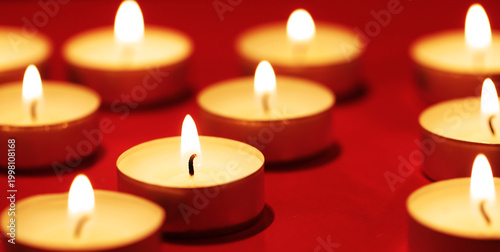 Burning candles. Candle. Flame. Light. Dark. Background. Romance. Fire