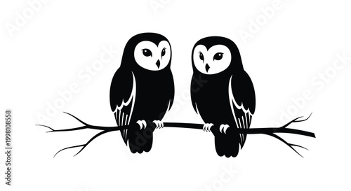 Two owls perched on a branch black silhouette