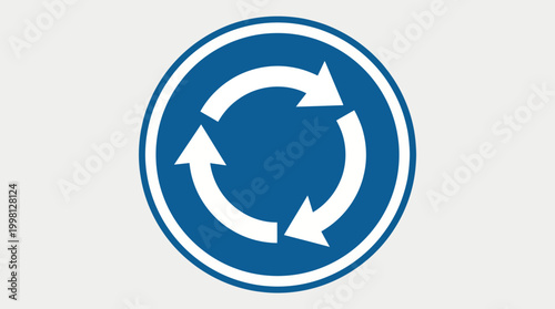 Roundabout traffic sign showing circular arrows on a blue background, indicating a traffic circle or rotary