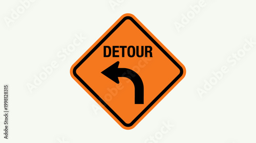 Orange diamond road sign showing 'DETOUR' and a left arrow, guiding drivers through temporary route changes for safety during construction or road closures