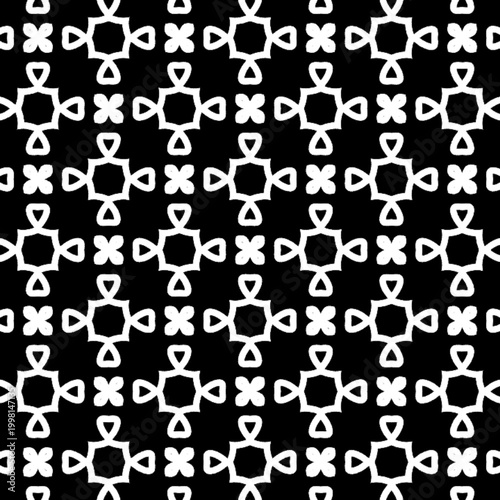 Seamless Black and White Bold Geometric Octagon Cross Petal Teardrop Pattern