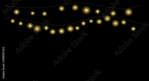 Glowing string lights in warm golden lighting on black background for festive decoration