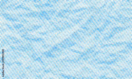 Blue halftone dot pattern background with gradient effect, abstract pop art comic book style texture for graphic design and web backgrounds