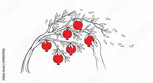 Hand reaching for red pomegranates on a windswept tree branch with falling leaves