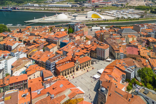Tableau sur toile Aerial Perspective of Aviles City with Red Tiled Roofs