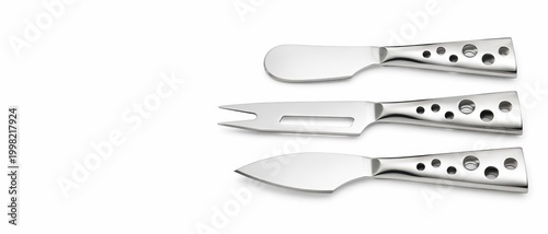 stainless steel cheese knife set with cheese shaped handles inspired by swiss cheese wedges including a spreader pronged knife and parmesan knife arranged as a hero product composition