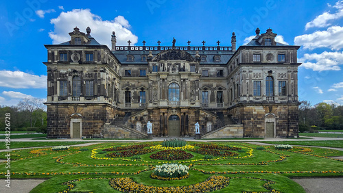 Baroque Palais in the Great Garden of Dresden with Spring Flowers and Blue Sky