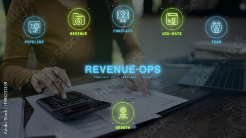 Cuadro en lienzo Revenue operations manager analyzing business data using calculator with digital