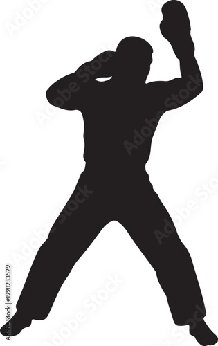 Silhouette of a boxer in defensive stance ready for combat