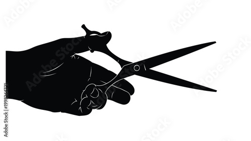 A hand firmly holding open scissors in a dark silhouette