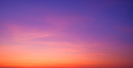 Twilight Sky Panoramic Background with Nature Gradient Light and Soft Pink Cloud on Colorful Orange and Blue Romantic Evening sky after Sundown