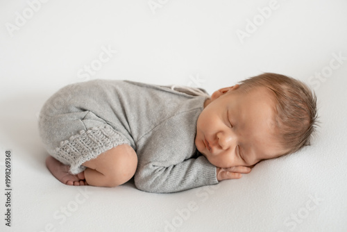 portrait of a sleeping newborn baby, space for text, a little baby sleeping peacefully