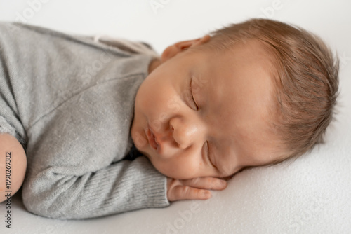 portrait of a sleeping newborn baby, space for text, a little baby sleeping peacefully