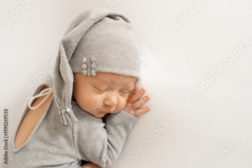 portrait of a sleeping newborn baby, space for text, a little baby sleeping peacefully