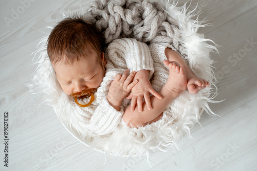 portrait of a sleeping newborn baby, space for text, a little baby sleeping peacefully