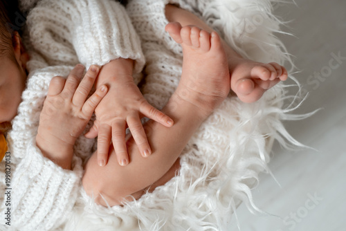 arms and legs of a newborn baby