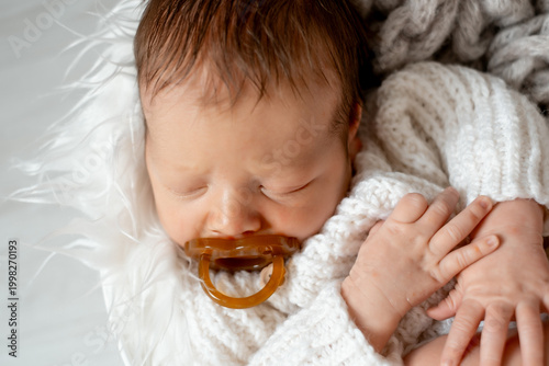 portrait of a sleeping newborn baby, space for text, a little baby sleeping peacefully