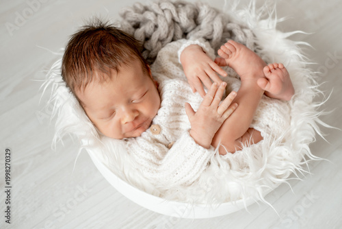 portrait of a sleeping newborn baby, space for text, a little baby sleeping peacefully