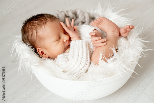 portrait of a sleeping newborn baby, space for text, a little baby sleeping peacefully