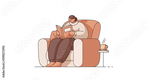 Man sitting on armchair reading book.