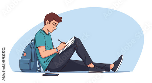 Young man in glasses sitting on the floor, writing in a notebook with a pen, leaning against a backpack for a study concept and concentrated learning