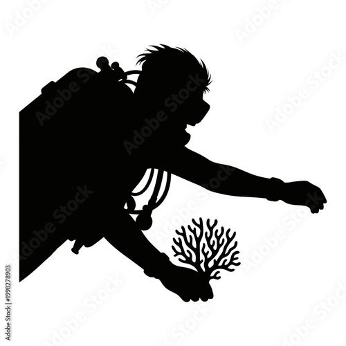Silhouette of a Scuba Diver Examining Coral Reef.