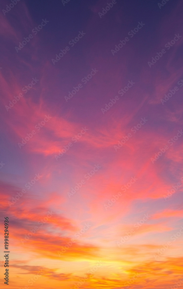 Fototapeta premium Aesthetic sky background featuring a blend of purple, magenta, and golden morning light.