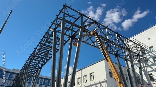 Builders are building a ground crossing that connects the buildings. Construction of ground crossing between buildings