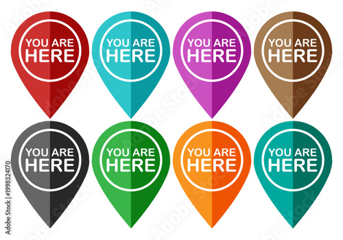 Colección de marcadores de ubicación coloridos con el texto you are here
