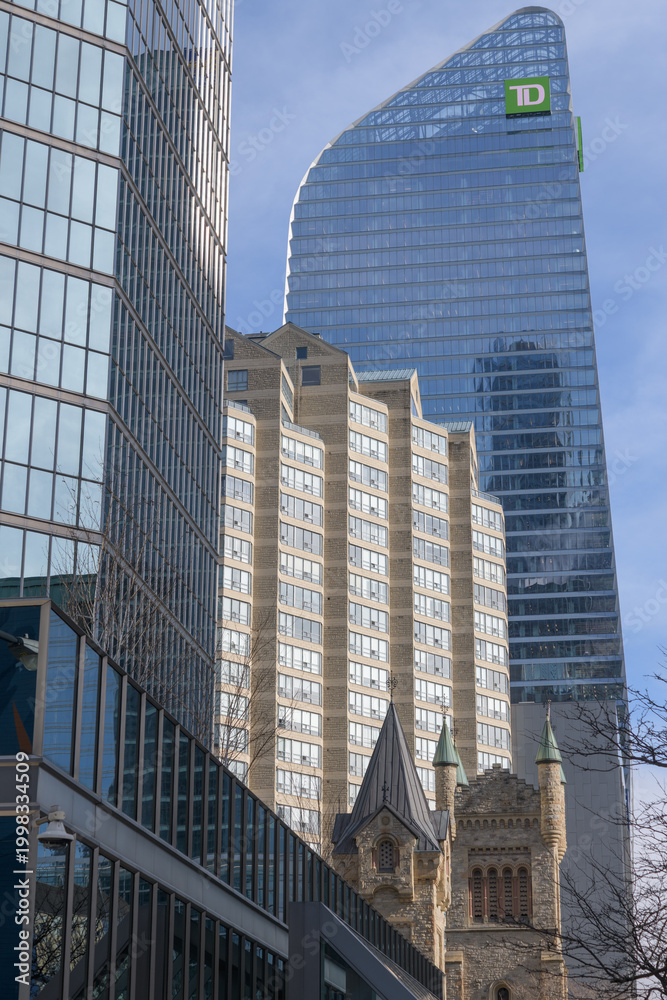 Fototapeta premium Symphony Place (71 Simcoe St) between office towers and St. Andrew's Presbyterian Church, Toronto