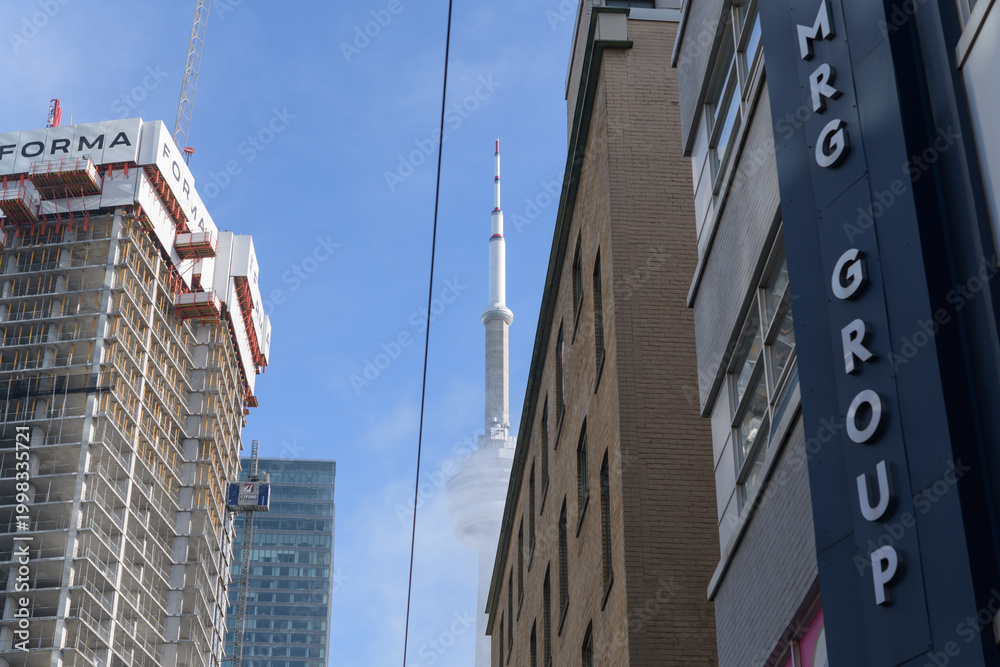 Obraz premium view south (up) Duncan St to King St W (incl FORMA condo, designed by Frank Gehry) and MRG Group (Live), music management and promotion office at 26 Duncan St W, Toronto