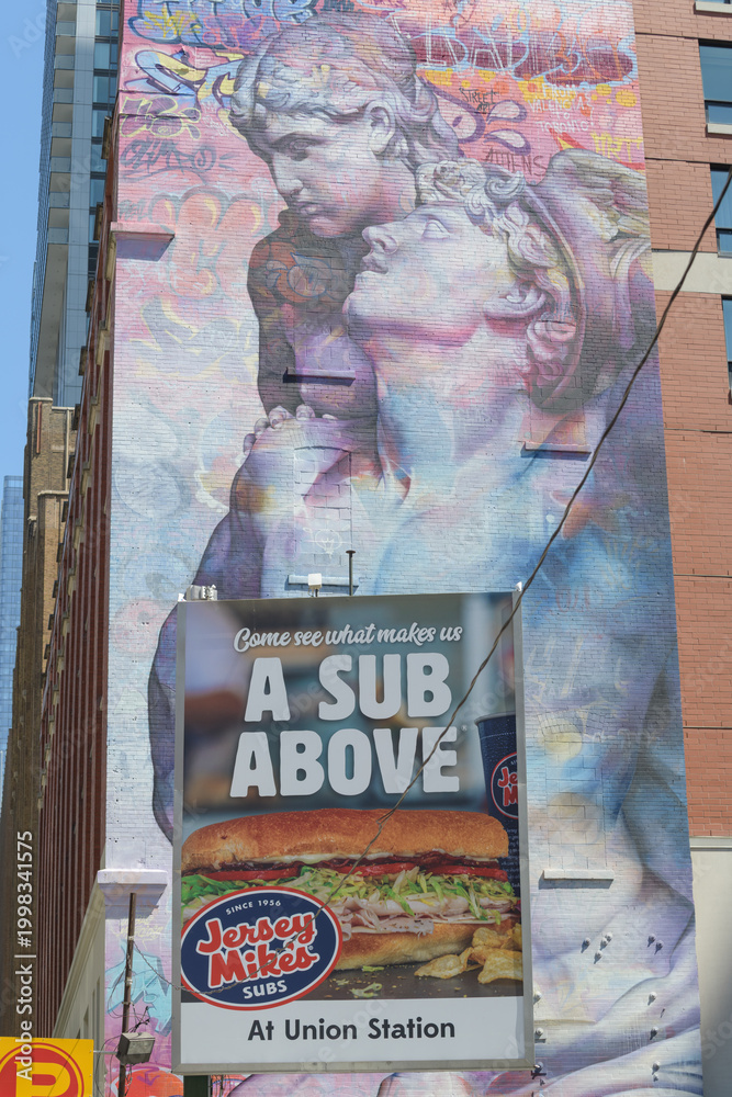 Naklejka premium roadside billboard advertisement for Jersey Mike's at Union Station at parking lot near Revery Toronto Downtown, Adelaide St W, Toronto