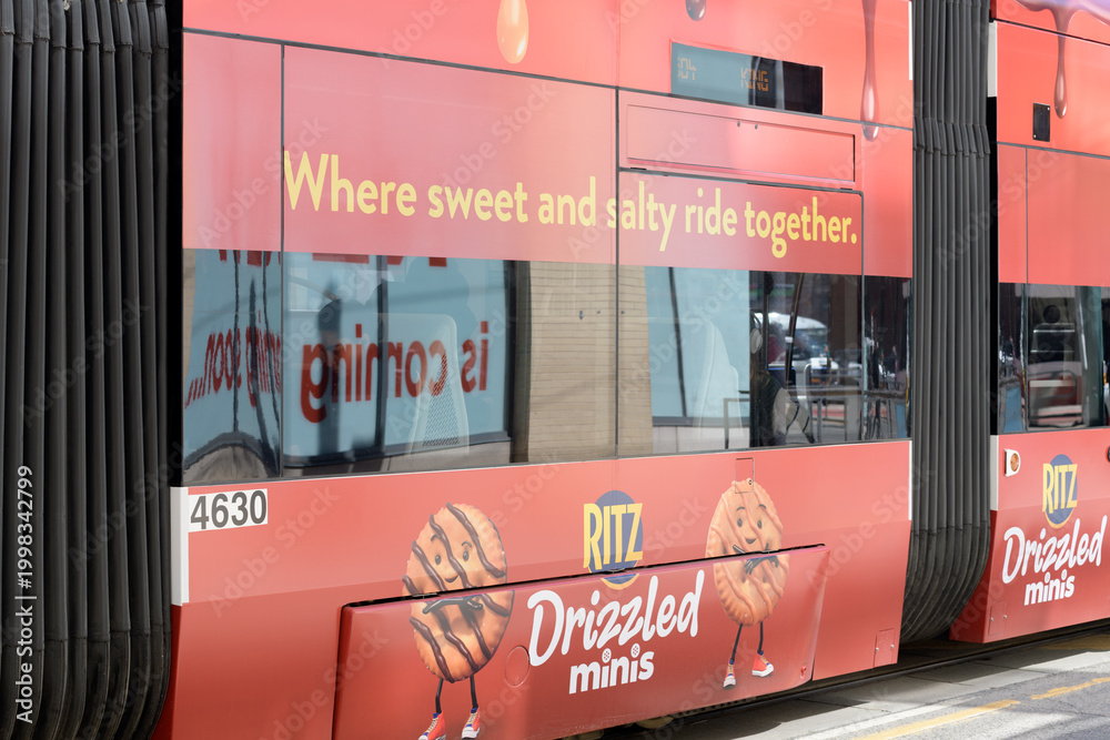 Fototapeta premium trolley car advertising wrap featuring Ritz advertising in Toronto