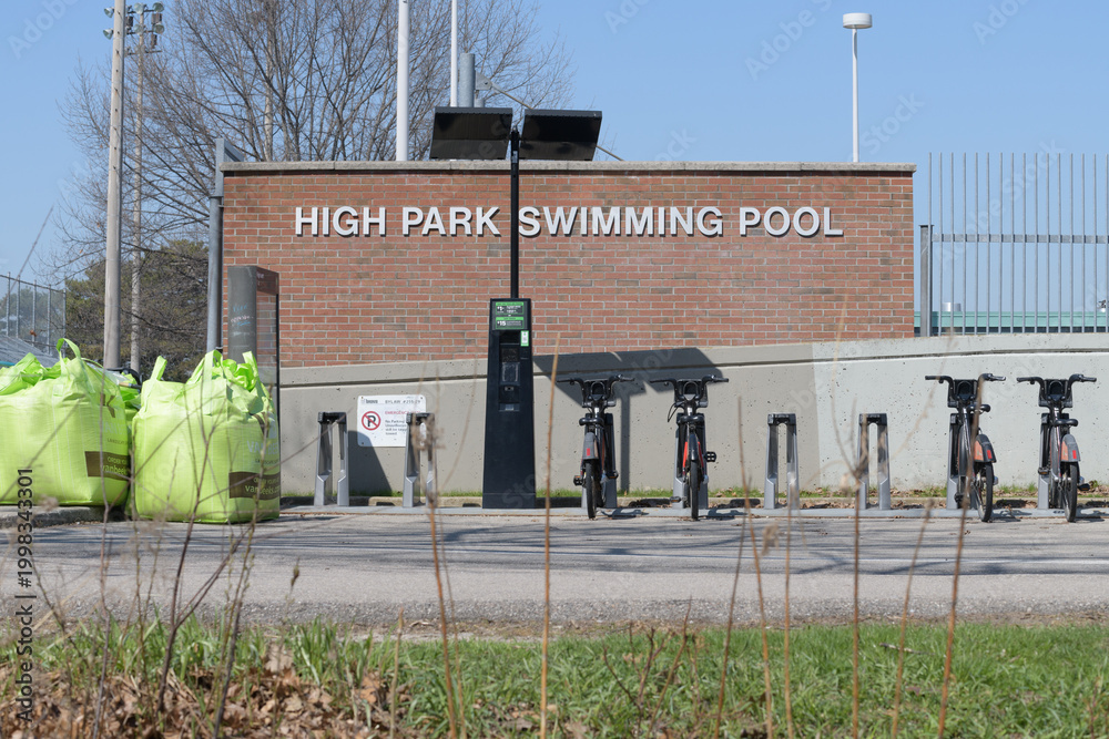 Fototapeta premium High Park Swimming Pool & Bike Share Toronto docking station at 1873 Bloor St W