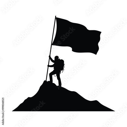 Silhouette of mountaineer standing on mountain peak holding a flag